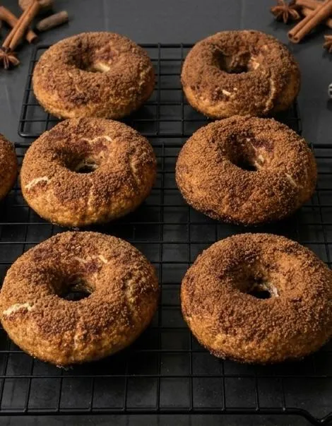 Cinnamon crunch bagels on a cooling rack