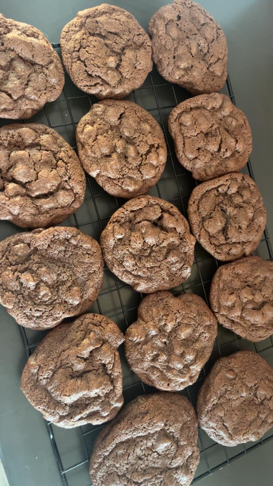 Double chocolate cookies on a cooling rack
