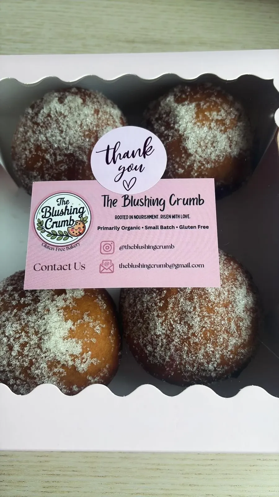 Boxed donuts with The Blushing Crumb business card